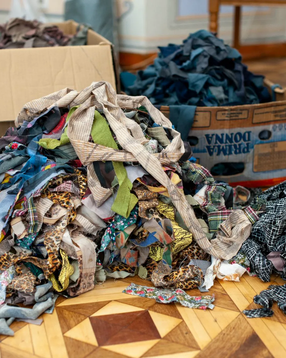 Boxes of shredded textiles