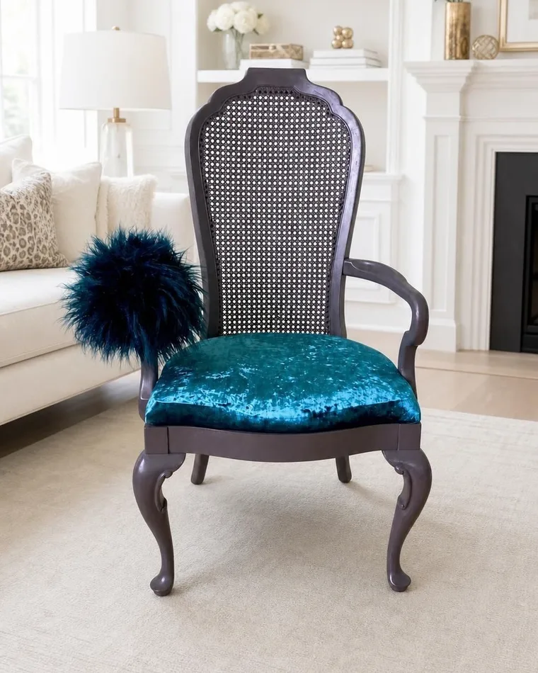 The same armchair redesigned in teal velvet, in a living room